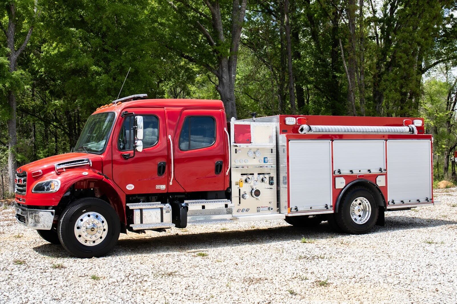 A Fouts Fire Commercial Crew Pumper is pictured outdoors.